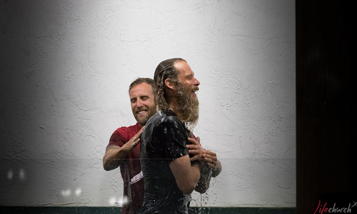 Ps. Matt baptizing man LifechurchX Jerseyville, IL and Waterloo-Columbia, IL